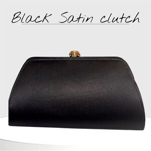 Elegant Black Satin Clutch with Rhinestone Clasp
- Perfect for Any Occasion!